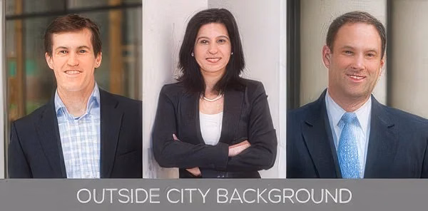 Outside city background — three headshots taken outdoors against pale stone and glass buildings, labelled “Outside City Background”
